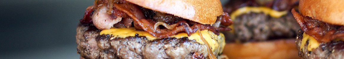 Eating Burger at Bates Burgers restaurant in Livonia, MI.
